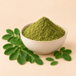Herboria Moringa Powder pouch with fresh moringa leaves and green powder bowl