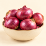 Herboria Fresh Onion Whole 1kg pouch with fresh red onions in ceramic bowl
