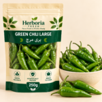 Fresh large green chilies hari mirch in ceramic bowl on cream background
