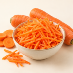 Herboria Fresh China Carrot Julienne 250g pouch with fresh julienne-cut carrots in ceramic bowl