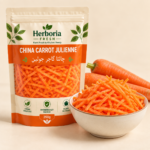 Fresh China carrot julienne orange gajar strips in ceramic bowl with whole carrots on cream background