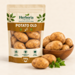 Fresh old potatoes aloo in wooden bowl on cream background